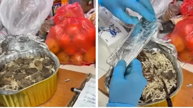 Алматыда тергеу изоляторына ұялы телефонды бешбармақтың арасына салып өткізбек болған