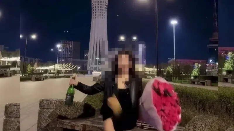 Астанада контент үшін "Бәйтерек" маңына шампан төккен блогер қыз жазаланды
